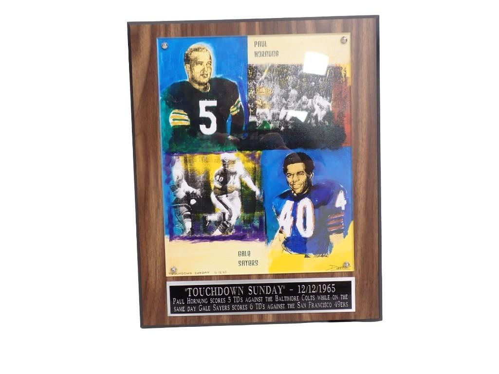 Touchdown Sunday Football Plaque 10"x13 1/2": Touchdown Sunday Football Plaque . Says "Touchdown Sunday 12/12/1965 Paul Hornung Scores 5 TD's against the Baltimore Colts while on the same day Gale Sayers scores 6 TD's against th