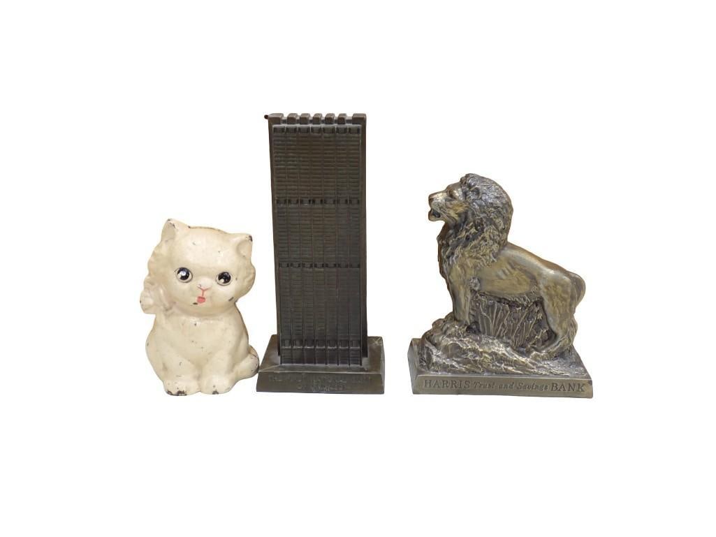 Cast Iron Toy Cat, Harris Lion Coin Bank, First National Bank of Chicago Coin Bank: Cast Iron Toy Cat, Harris Lion Coin Bank, First National Bank of Chicago Coin Bank. The 2 coin banks do not have a slot, only the bottoms open. All pictures are considered part of the