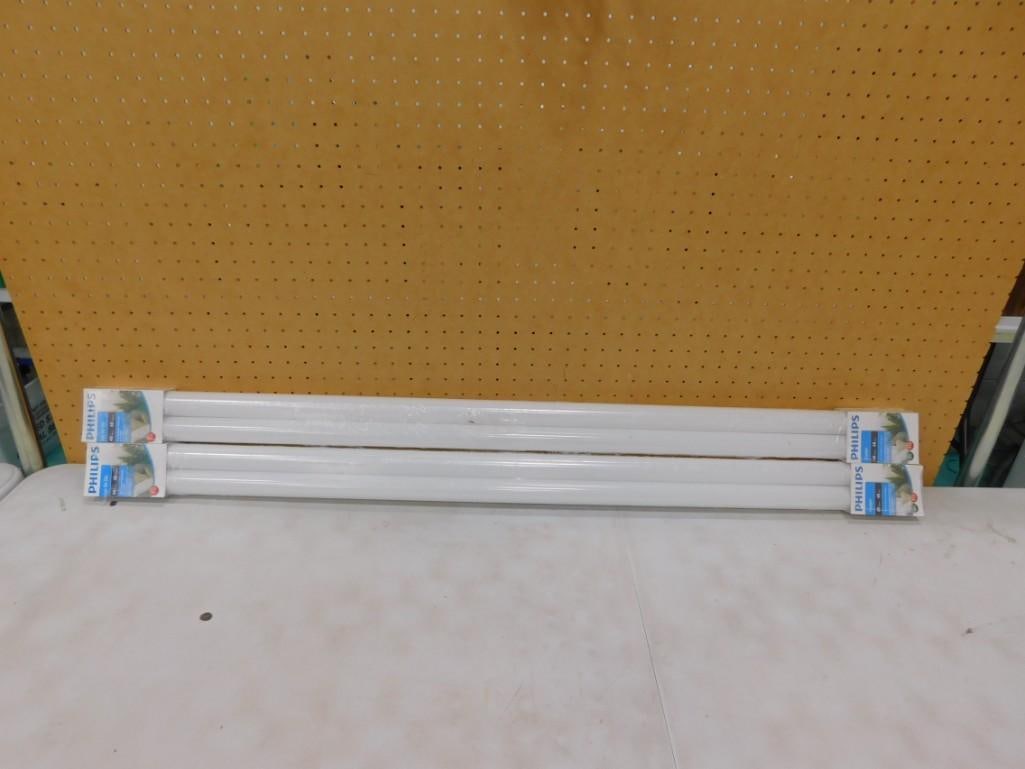 Two Sets of Two Philips Fluorescent T12 Light Bulbs - New in Packages: Two Sets of Two Philips Fluorescent T12 Light Bulbs - New in Packages All pictures are considered part of the description and should be examined carefully by bidders. Live Auctioneers is now