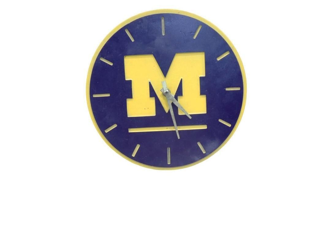 University of Michigan Wall Clock: University of Michigan Wall Clock All pictures are considered part of the description and should be examined carefully by bidders. Live Auctioneers is now offering Live Shipping through them. This i