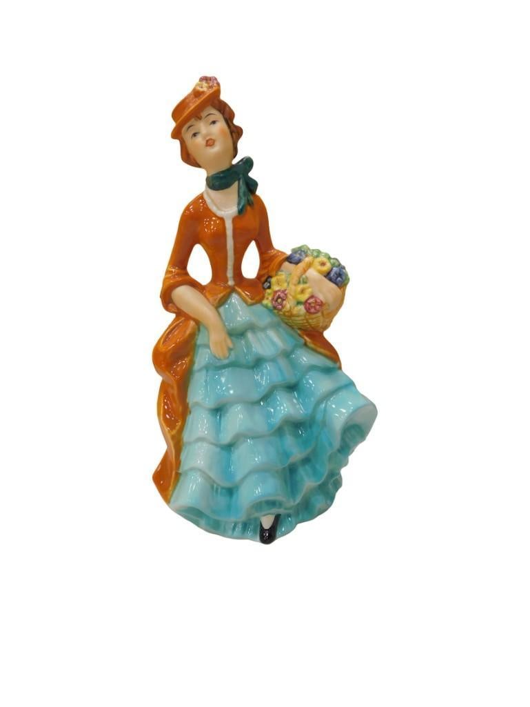 Goebel Porcelain Figurine Made in West Germany Lady with Basket and Flowers FF274: Goebel Porcelain Figurine Made in West Germany Lady with Basket and Flowers FF274 All pictures are considered part of the description and should be examined carefully by bidders. Live Auctioneers is