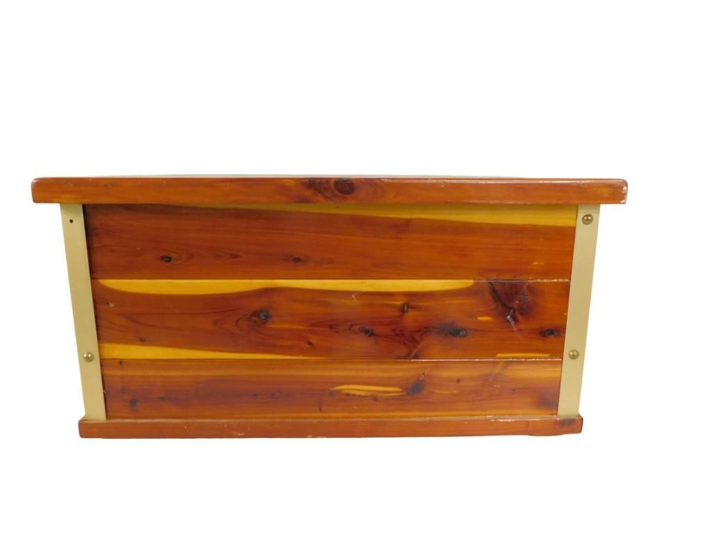 Wooden Cedar Chest Measures roughly 24x15x12": Wooden Cedar Chest Measures roughly 24x15x12" All pictures are considered part of the description and should be examined carefully by bidders. Live Auctioneers is now offering Live Shipping throug