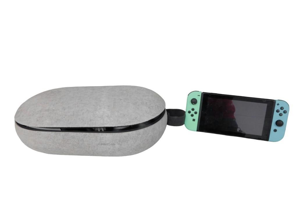 Nintendo Switch - Teal color and a Meta Quest 2 VR Headset (1 of 5)