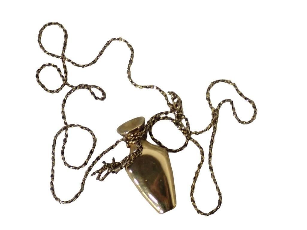 Ciani Gilt Vermeil Sterling Silver Bottle Necklace Length: 30" Weight: 1.35 ozt: Ciani gilt vermeil sterling silver bottle necklace? Length: 30" Weight:?1.35 ozt? Dime is shown for a size comparison only and is not included. All pictures are considered part of the descriptio