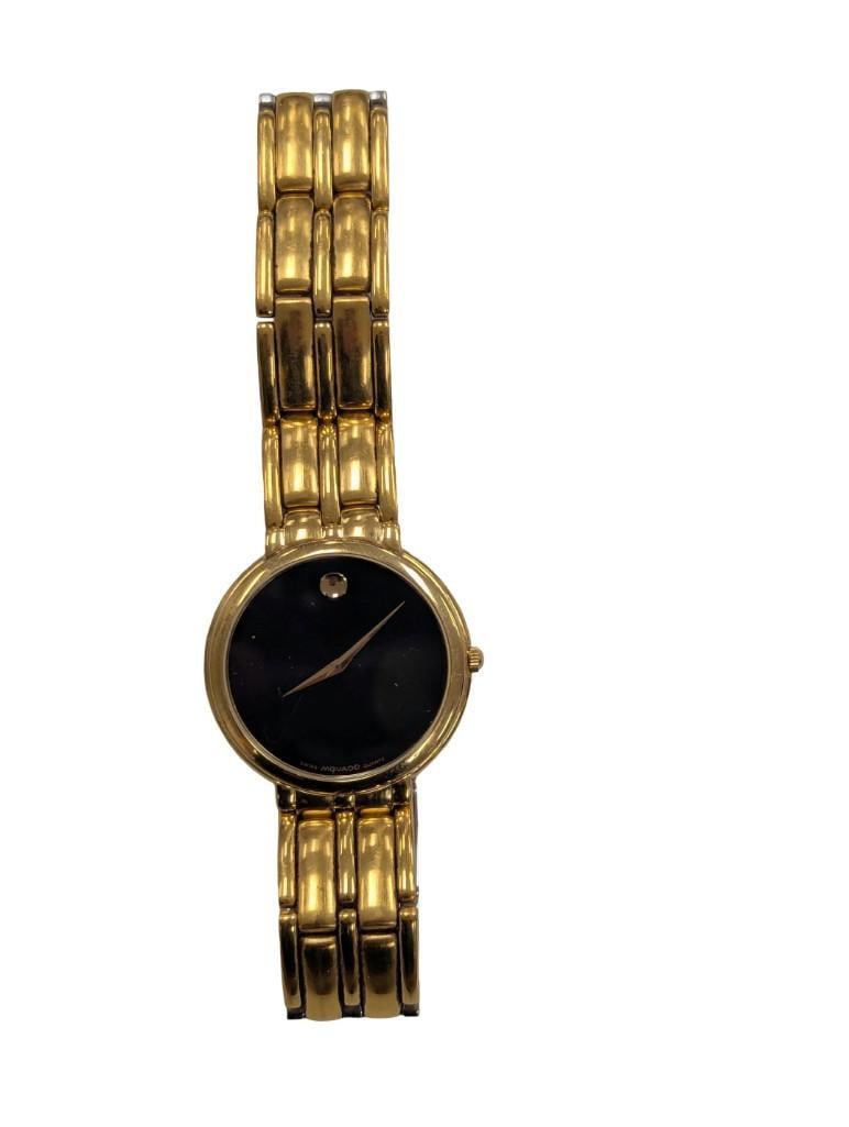 Movado Swiss Quartz Gold Tone Watch: Movado Swiss Quartz Gold Tone Watch All pictures are considered part of the description and should be examined carefully by bidders. Live Auctioneers is now offering Live Shipping through them. This i