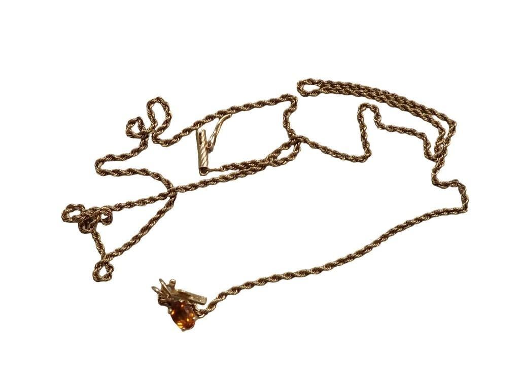Citrine Pendant in 14 K Gold with Chain - Total weight is roughly 4.6 grams: Citrine Pendant in 14 K Gold with Chain - Total weight is roughly 4.6 grams All pictures are considered part of the description and should be examined carefully by bidders. Live Auctioneers is now off