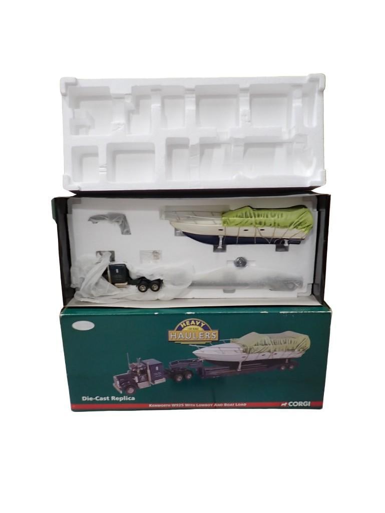 Corgi Heavy Haulers Kenworth W925 with Lowboy and Boat Load Limited Edition 719 of 1680: Corgi Heavy Haulers Kenworth W925 with Lowboy and Boat Load Limited Edition 719 of 1680 Model Semi Truck with Boat or Yacht in Original Box 1:50 Scale Model All pictures are considered part of the de