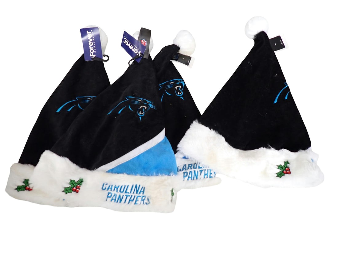 Carolina Panthers Santa Claus Hats - New with Tags: Carolina Panthers Santa Claus Hats - New with Tags - they smell of smoke, but could probably be aired out or washed. All pictures are considered part of the description and should be examined carefull