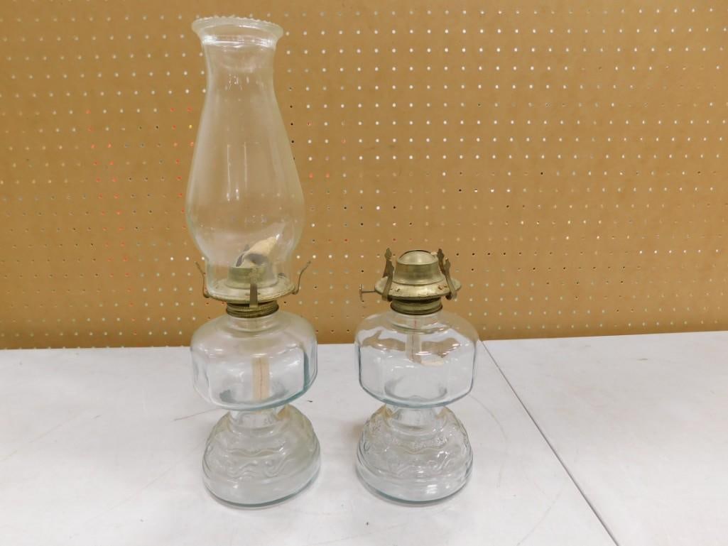 2 Vintage Kerosene or Oil Lamps: 2 Vintage Kerosene or Oil Lamps. 1 has a shade and 1 does not. All pictures are considered part of the description and should be examined carefully by bidders. Live Auctioneers is now