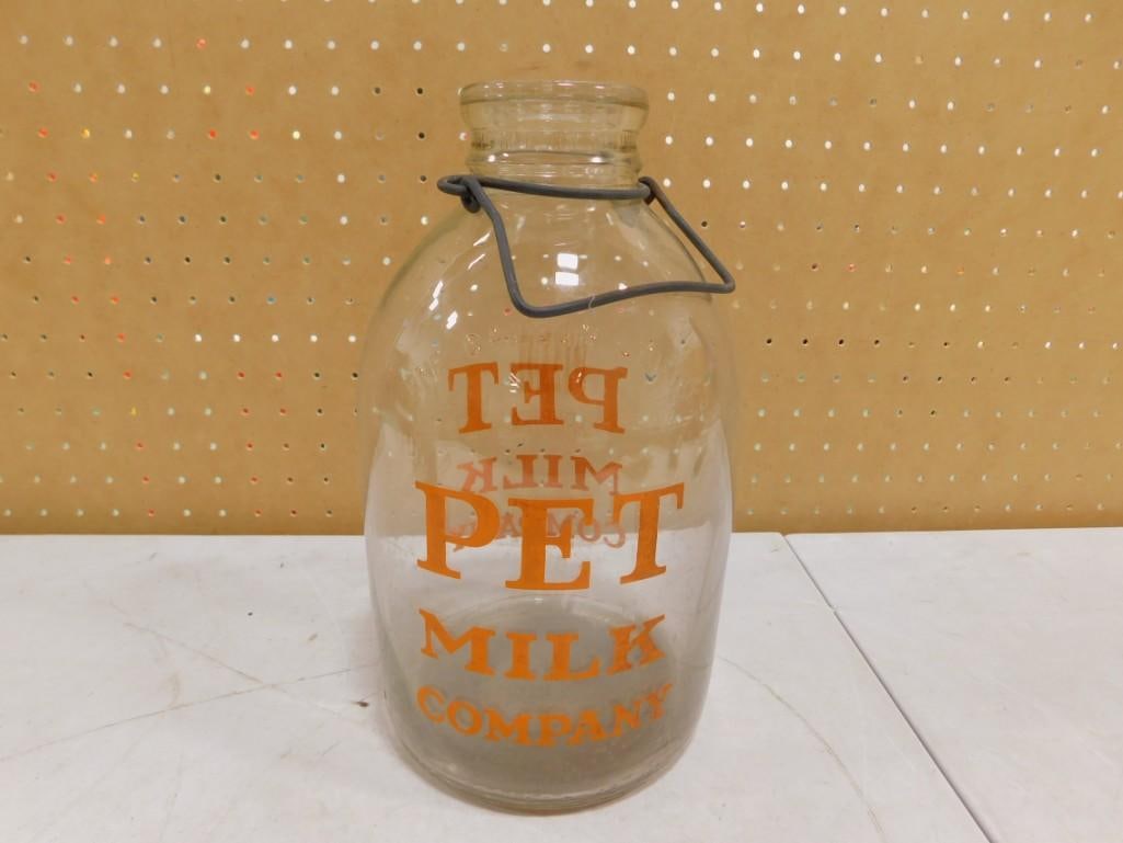 Vintage Pet Milk Company Milk Bottle: Vintage or Antique Pet Milk Company Milk Bottle All pictures are considered part of the description and should be examined carefully by bidders. Live Auctioneers is now offering Live Shipping through 