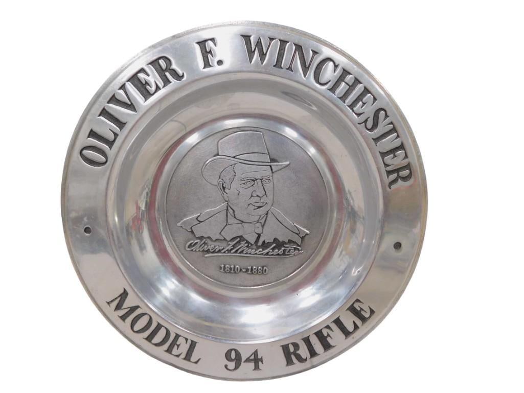Oliver F. Winchester Model 94 Rifle Pewter Commemorative Plate: Oliver F. Winchester Model 94 Rifle Pewter Commemorative Plate All pictures are considered part of the description and should be examined carefully by bidders. Live Auctioneers is now offering Live
