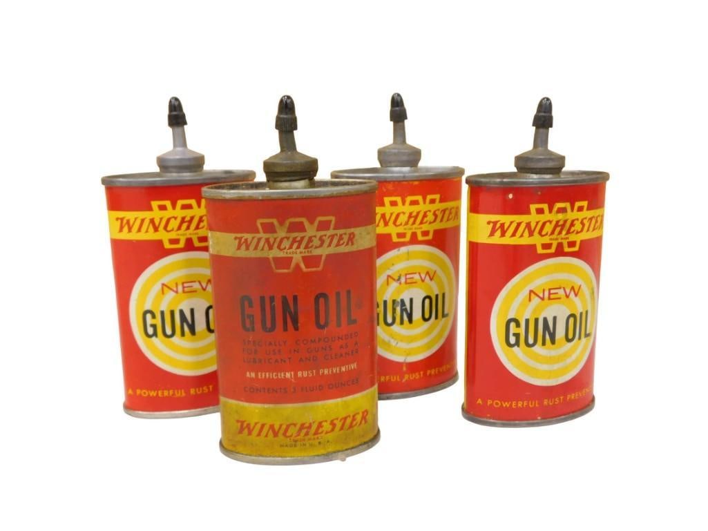 4 Vintage Winchester Gun Oil Cans: 4 Vintage Winchester Gun Oil Cans Condition: these are being sold as collectible cans with no guarantees as to the quality or quantity of anything inside. All pictures are considered part