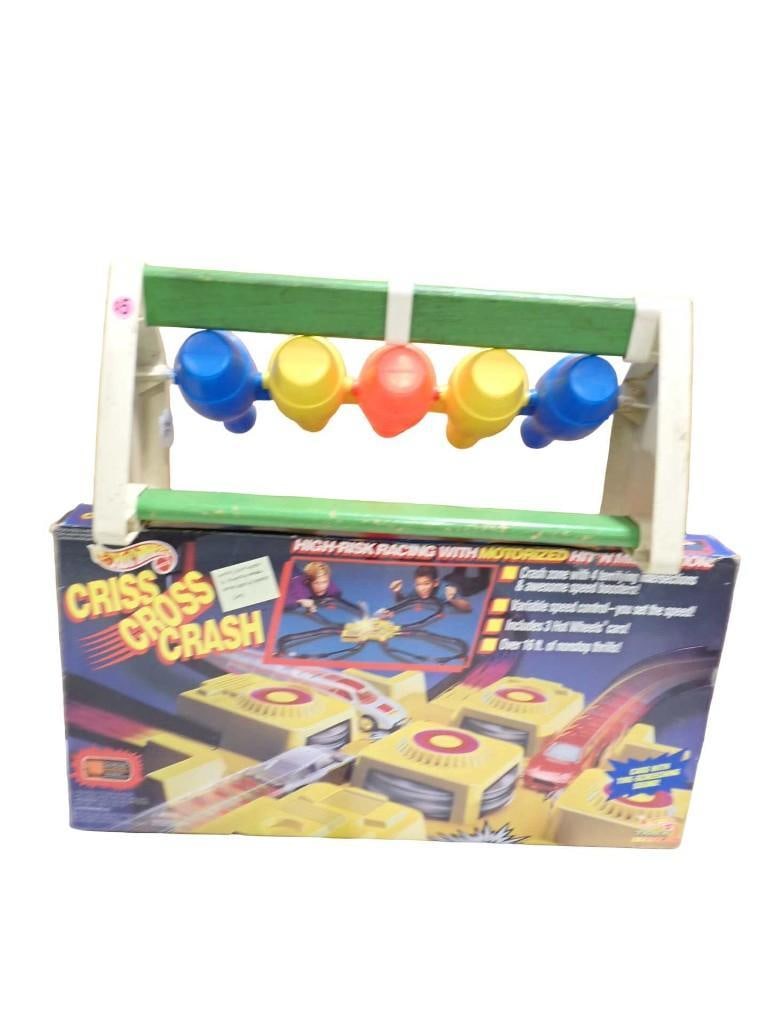 Vintage 1992 Hot Wheels Criss Cross Crash Playset and a Bowling Toy: Vintage 1992 Hot Wheels Criss Cross Crash Playset and a Bowling Toy. In the Criss Cross Crash set, it works but the motor is slightly weak. It works best with lighter cars. All pictures a
