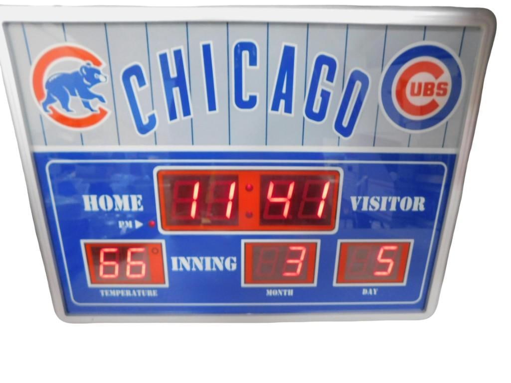 Chicago Cubs LCD Digital Scoreboard Clock / Thermometer: Chicago Cubs LCD Digital Scoreboard Clock / Thermometer All pictures are considered part of the description and should be examined carefully by bidders. Live Auctioneers is now offering Live Shipping 
