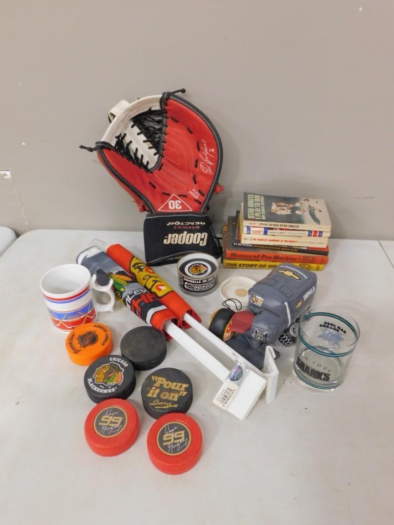 Hockey Lot including Pucks, Goalie Glove, Books, Collectibles, Chicago Blackhawks, etc. (1 of 5)