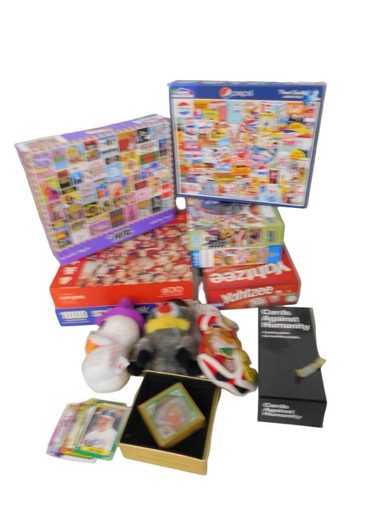 Puzzle and Game Lot including Yahtzee, Pepsi, 1970's, Santa Claus, Cards against humanity, Plush, et (1 of 4)