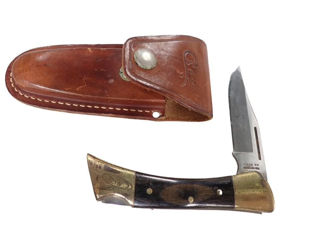 Case XX Single Blade Lockback Shark Tooth Knife in a Leather Holster: Case XX Single Blade Lockback Shark Tooth Knife in a Leather Holster All pictures are considered part of the description and should be examined carefully by bidders. Live Auctioneers is now offering