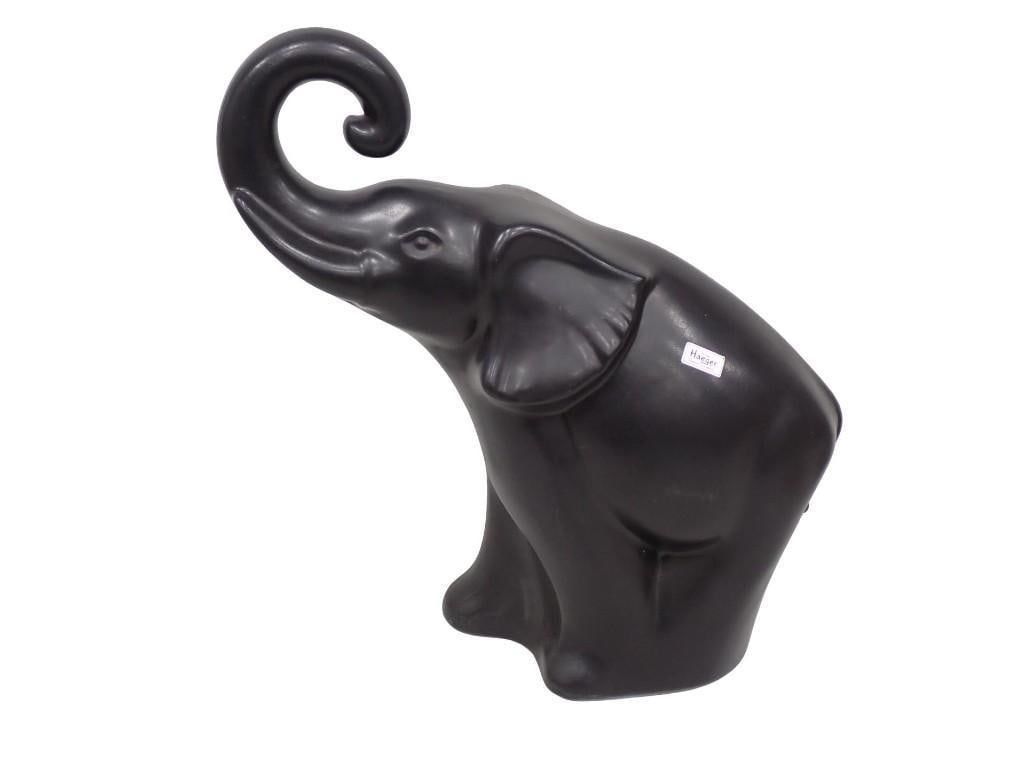 Royal Haeger Pottery Elephant Statue: Royal Haeger Pottery Elephant Statue or Figure All pictures are considered part of the description and should be examined carefully by bidders. Live Auctioneers is now offering Live Shipping through