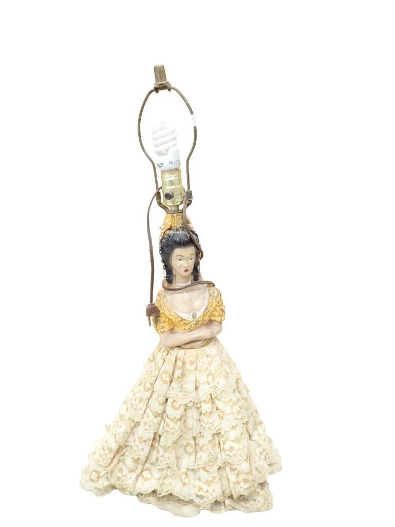 Porcelain Lamp of a Lady Figure with a Cloth Dress: Porcelain Lamp of a Lady Figure with a Cloth Dress Condition: has some damage All pictures are considered part of the description and should be examined carefully by bidders. Live Auctio