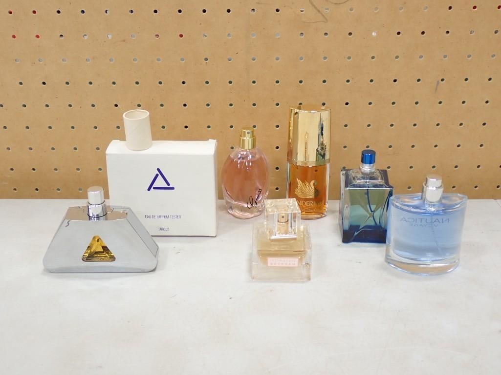 Lot of Perfume Bottles incl Nautica, Vanderbilt, Guess, etc: Lot of Perfume Bottles incl Nautica, Vanderbilt, Guess, etc Condition: these are being sold as collectible bottles only with no guarantees as to the quality or quantity of anything in