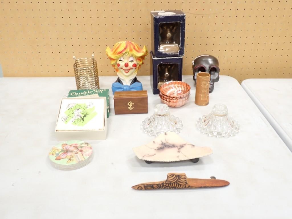 Collectibles incl Skull Candle, Vintage Inarco Japan Clown Planter, Ran Head Figures, etc: Collectibles incl Skull Candle, Vintage Inarco Japan Clown Planter, Ran Head Figures, Vintage Glass Candle holders, Mini Jello Molds, etc All pictures are considered part of the description and shoul