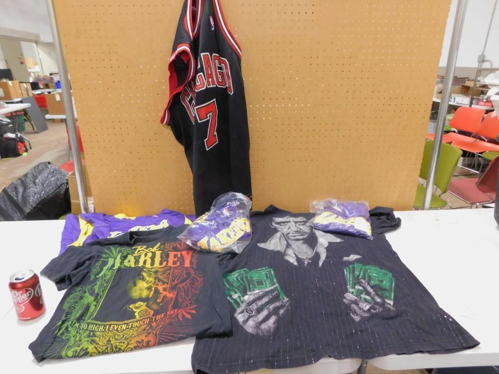 Bob Marley T Shirt, Scarface T Shirt, Chicago Bulls Jersey, Lakers Apparel: Bob Marley T Shirt, Scarface T Shirt, Chicago Bulls Jersey, Lakers Apparel All pictures are considered part of the description and should be examined carefully by bidders. Live Auctioneers is now of