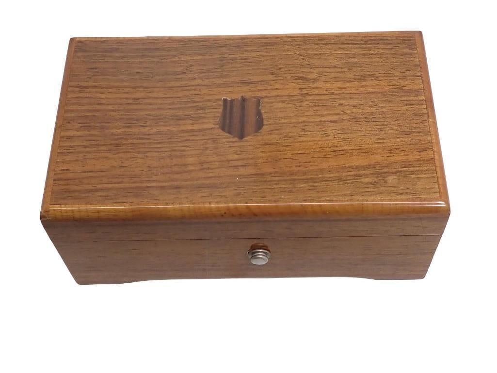 Thorens Swiss Cylinder Music Box: Thorens Swiss Cylinder Music Box. Wood music box with inlaid shield decoration on lid. Interior with label "No. 28 Moart's Drawing Room / Bleu Danube Valse / Murmures