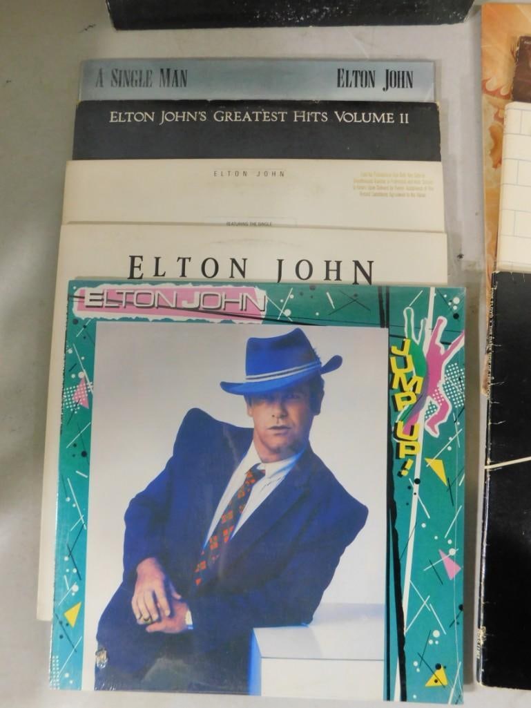 Lot of over 20 vinyl record albums including 6 from Elton John, 2 from Pink Floyd, plus Rolling Ston - 2