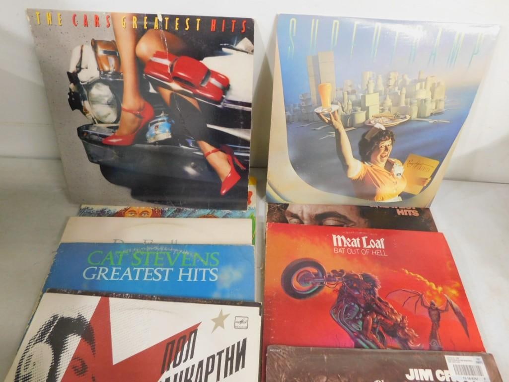 Lot of over 20 vinyl record albums including 6 from Elton John, 2 from Pink Floyd, plus Rolling Ston - 4