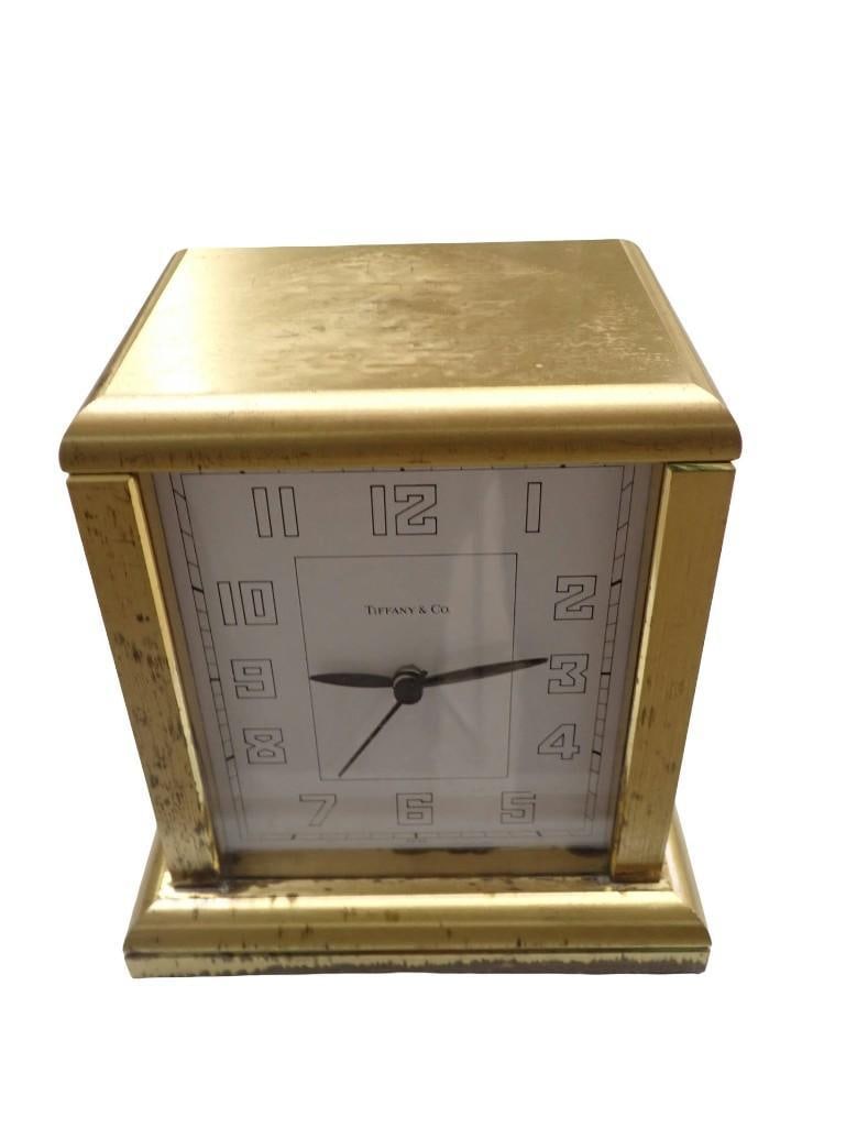 Vintage Tiffany & Co. Swiss Made Heavy Brass Desk Clock: Vintage Tiffany & Co. Swiss Made Heavy Brass Desk Clock All pictures are considered part of the description and should be examined carefully by bidders. Live Auctioneers is now offering Live Shipp