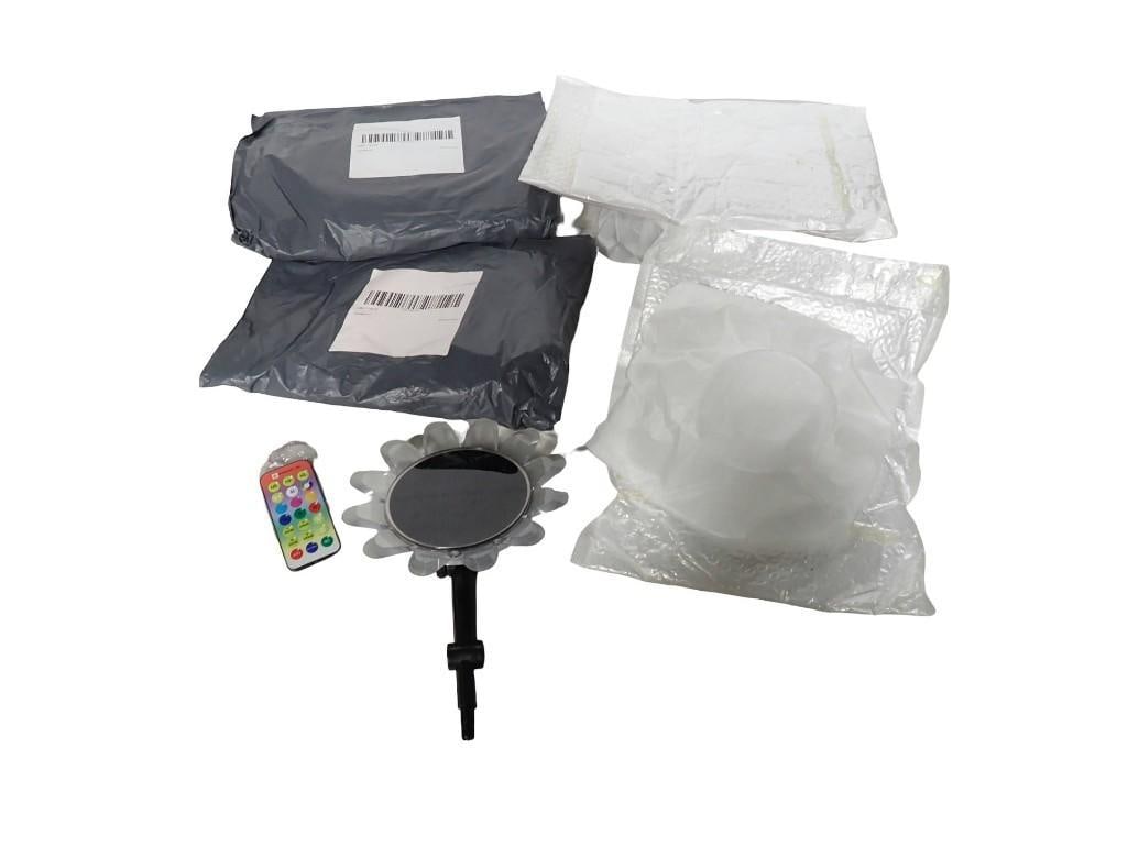 4 New in Package Solar Power LED Outdoor Garden Flower Lights with remote controls: 4 New in Package Solar Power LED Outdoor Garden Flower Lights with remote controls All pictures are considered part of the description and should be examined carefully by bidders. Live Auctioneers is 