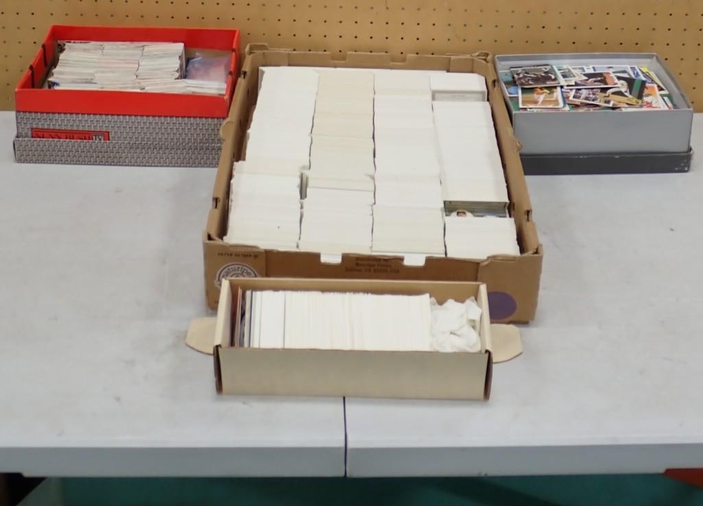 Boxes of Baseball and Football Cards, etc. Lots of them!: Boxes of Baseball and Football Cards, etc. Lots of them! All pictures are considered part of the description and should be examined carefully by bidders. Live Auctioneers is now offering Live Shipping
