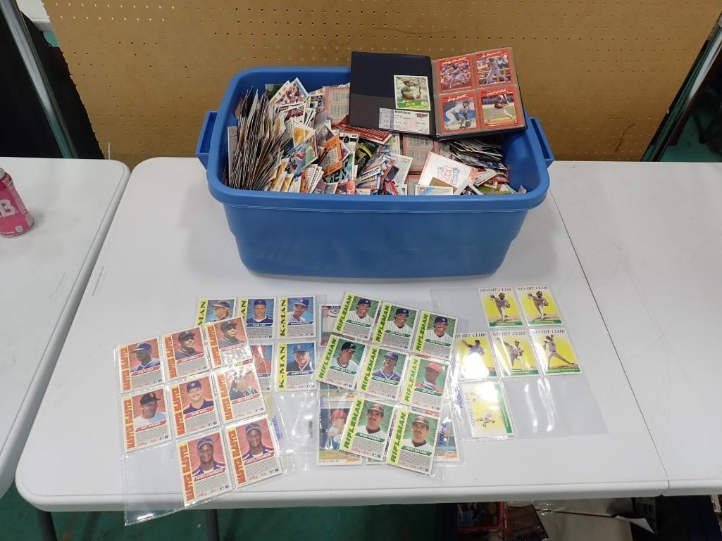 Lot of Sports Cards incl Baseball Cards: Lot of Sports Cards incl Baseball Cards. Approx 20 lbs including the bin All pictures are considered part of the description and should be examined carefully by bidders. Live Auctioneers is now 
