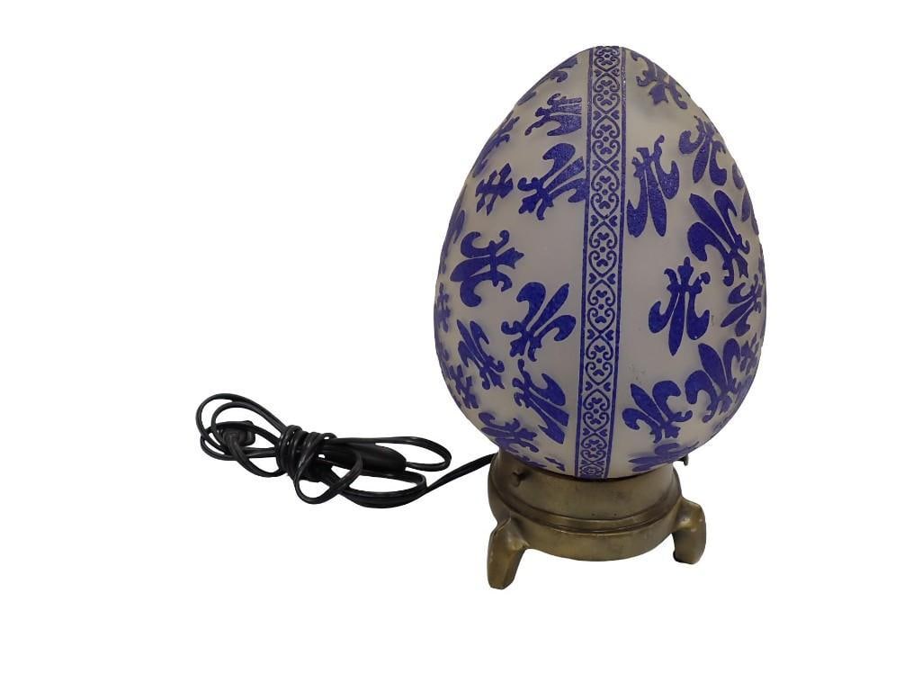 Decorative Glass Egg Lamp with Metal Stand: Decorative Glass Egg Lamp with Metal Stand All pictures are considered part of the description and should be examined carefully by bidders. Live Auctioneers is now offering Live Shipping through them.