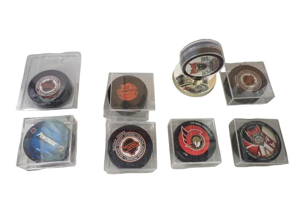 Lot of Hockey Pucks in Display Cases incl Ottawa Senators, NHL Ravens Athletic, Phantoms, etc: Lot of Hockey Pucks in Display Cases incl Ottawa Senators, NHL Ravens Athletic, Phantoms Inaugural Season, etc All pictures are considered part of the description and should be examined carefully by b