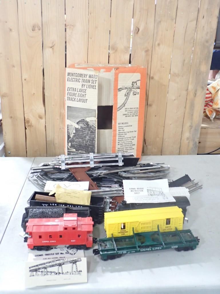 Vintage Montgomery Ward Electric Lionel Train Set - Comes with everything as shown: Vintage Montgomery Ward Electric Lionel Train Set - Comes with everything as shown All pictures are considered part of the description and should be examined carefully by bidders. Live Auctioneers is 