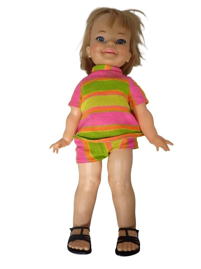 Vintage Ideal Giggles Doll with Flirty Eyes and Striped Outfit: Vintage Ideal Giggles Doll with Flirty Eyes and Striped Outfit All pictures are considered part of the description and should be examined carefully by bidders. Live Auctioneers is now offering Live Sh