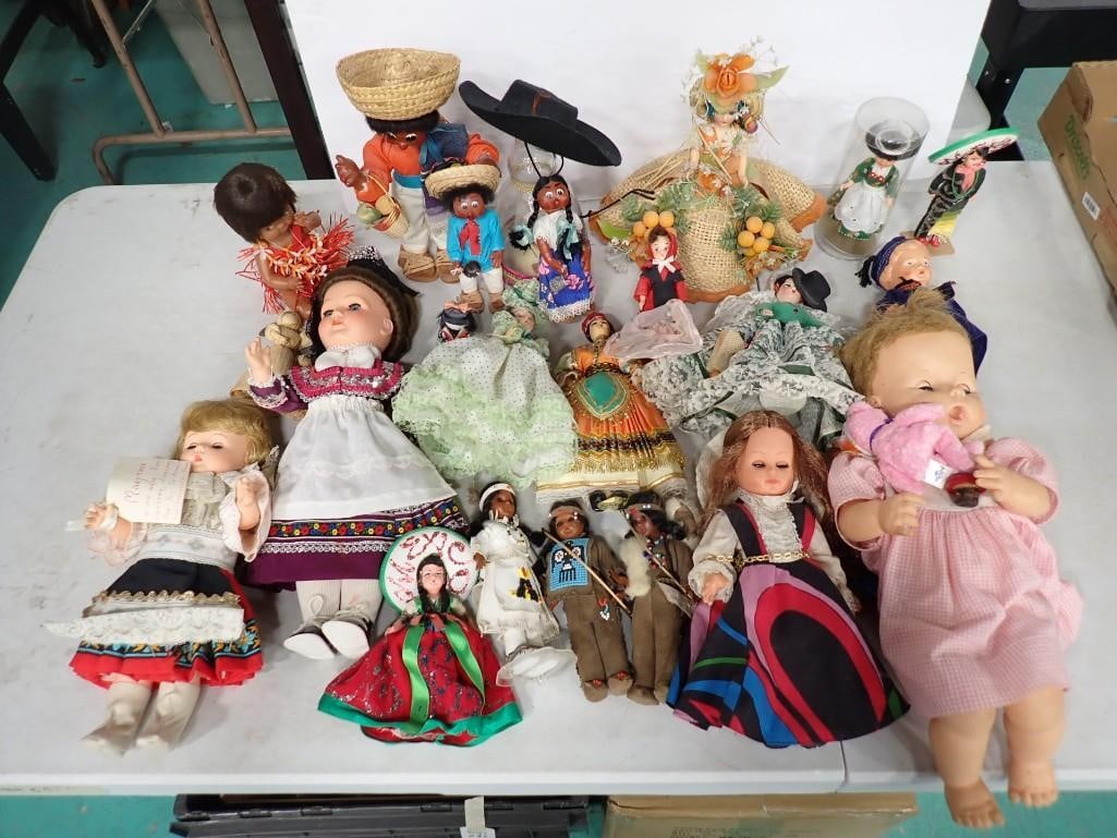 Large Lot of Dolls incl Baby Doll, Ethnic Dolls, etc: Large Lot of Dolls incl Baby Doll, Ethnic Dolls, etc All pictures are considered part of the description and should be examined carefully by bidders. Live Auctioneers is now offering Live Shipping thr
