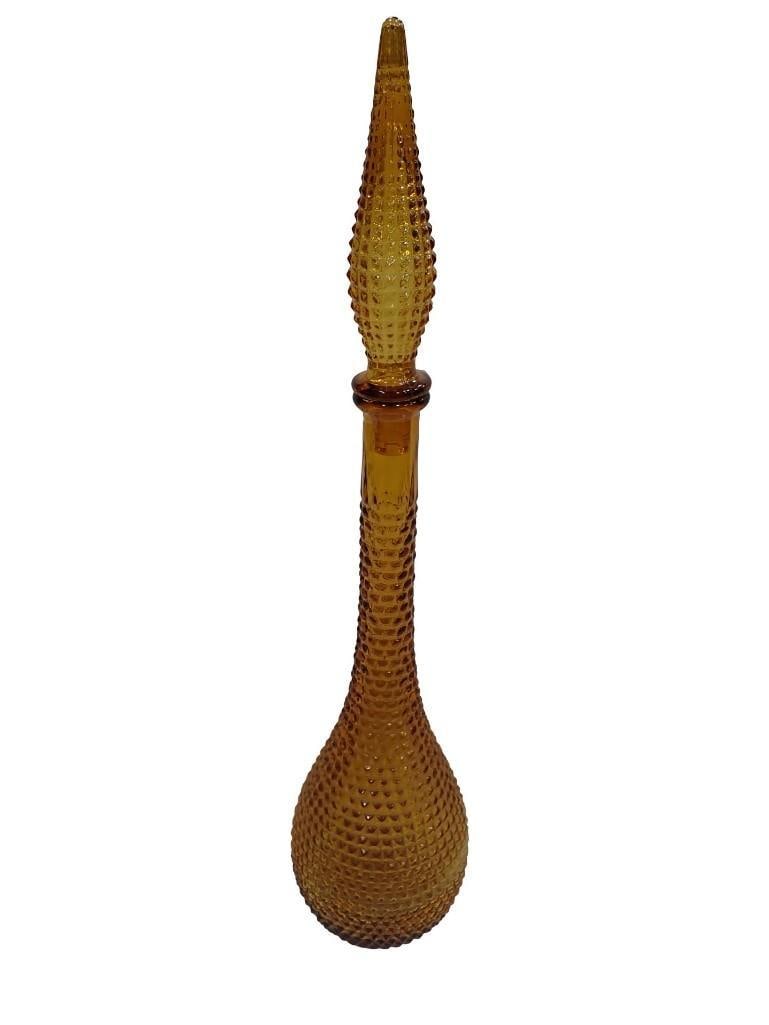 Large Vintage Empoli Genie Bottle Decanter with Stopper Amber Glass Made in Italy: Large Vintage Empoli Genie Bottle Decanter with Stopper Amber Glass Made in Italy All pictures are considered part of the description and should be examined carefully by bidders. Live Auctioneers is n