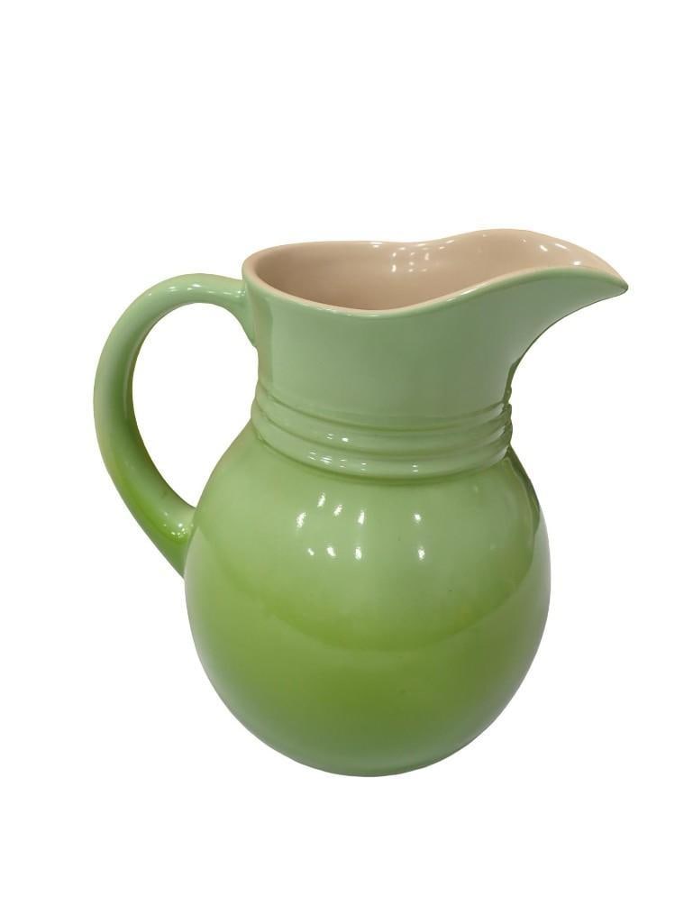 Le Creuset Pitcher Green: Le Creuset Pitcher Green All pictures are considered part of the description and should be examined carefully by bidders. Live Auctioneers is now offering Live Shipping through them. This is an option