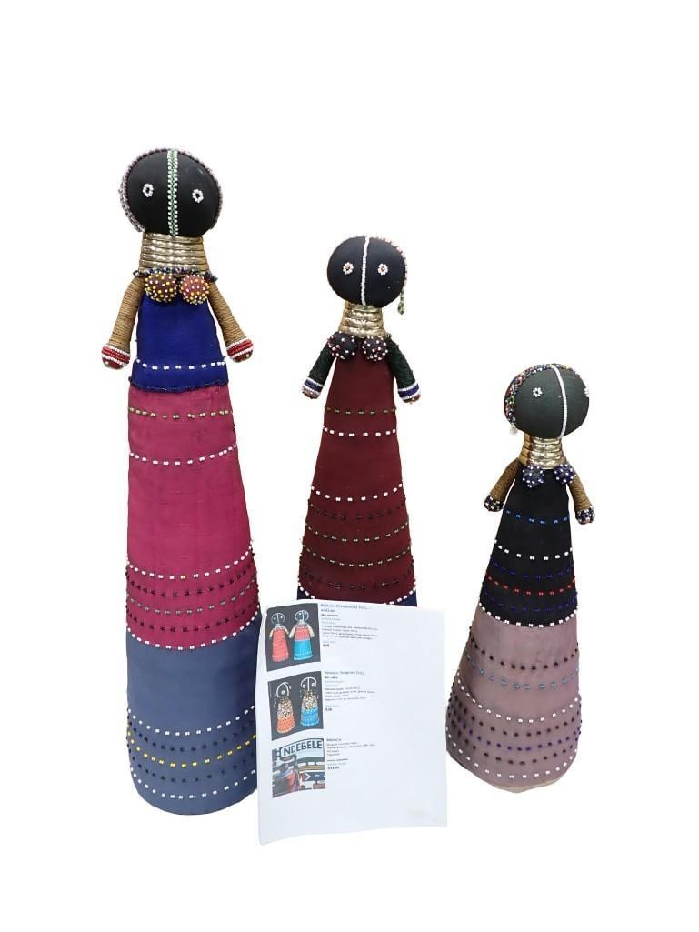 Set of 3 Ndebele Ceremonial Dolls: Set of 3 Ndebele Ceremonial Dolls - tallest one is about 29" All pictures are considered part of the description and should be examined carefully by bidders. Live Auctioneers is now offering Live 