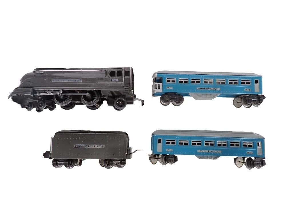 4 Model Train Cars including Lionel: 4 Model Train Cars including Lionel All pictures are considered part of the description and should be examined carefully by bidders. Live Auctioneers is now offering Live Shipping through them. This i