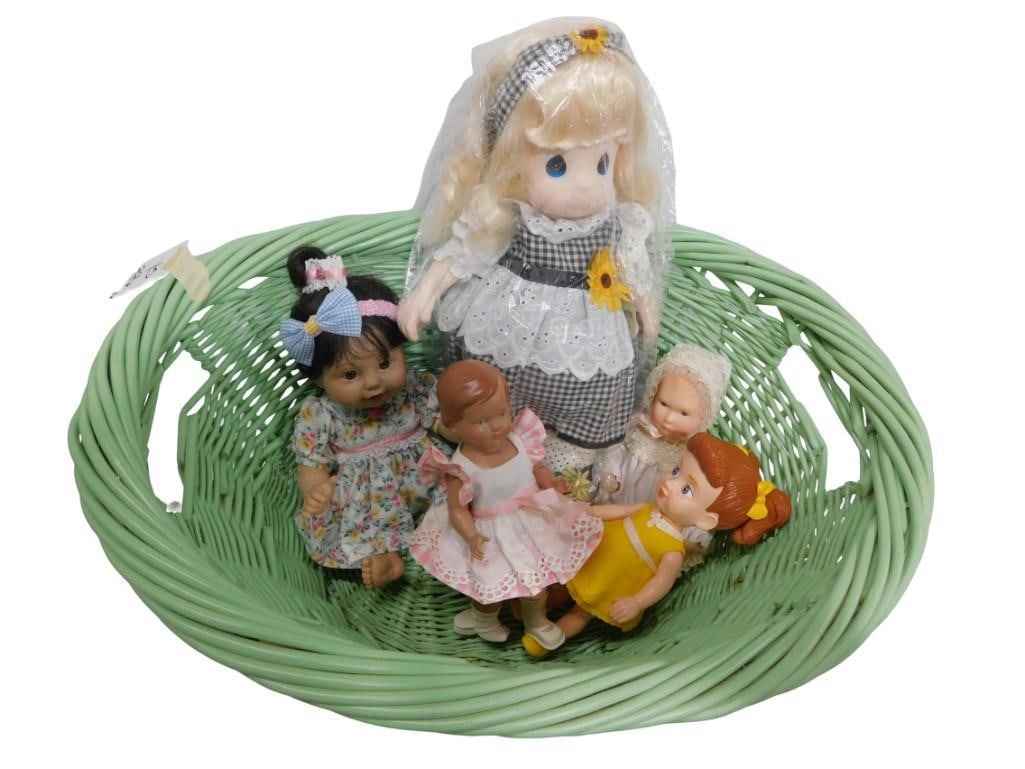 Wicker Basket with Precious Moments Little Sunshine Doll and other dolls: Wicker Basket with Precious Moments Little Sunshine Doll and other dolls All pictures are considered part of the description and should be examined carefully by bidders. Live Auctioneers is now offeri