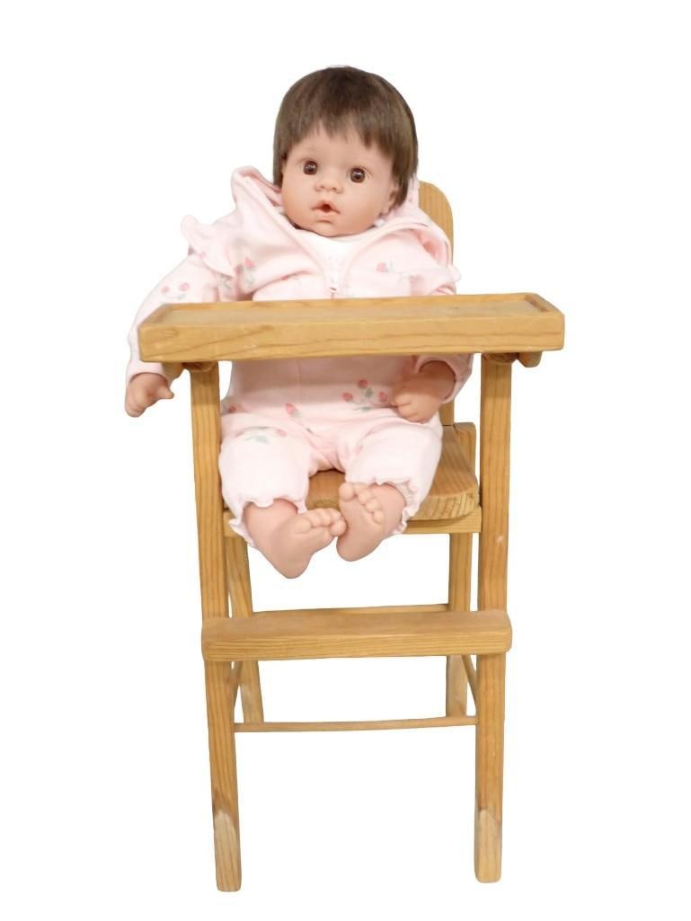 Reva Vinyl and Cloth Baby Doll in a Wooden High Chair: Reva Vinyl and Cloth Baby Doll in a Wooden High Chair All pictures are considered part of the description and should be examined carefully by bidders. Live Auctioneers is now offering Live Shipping th