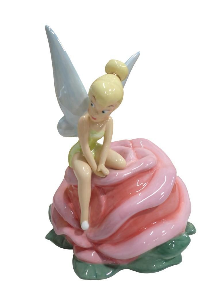 Walt Disney Parks Tinkerbell Ceramic Cookie Jar: Walt Disney Parks Tinkerbell Ceramic Cookie Jar All pictures are considered part of the description and should be examined carefully by bidders. Live Auctioneers is now offering Live Shipping through