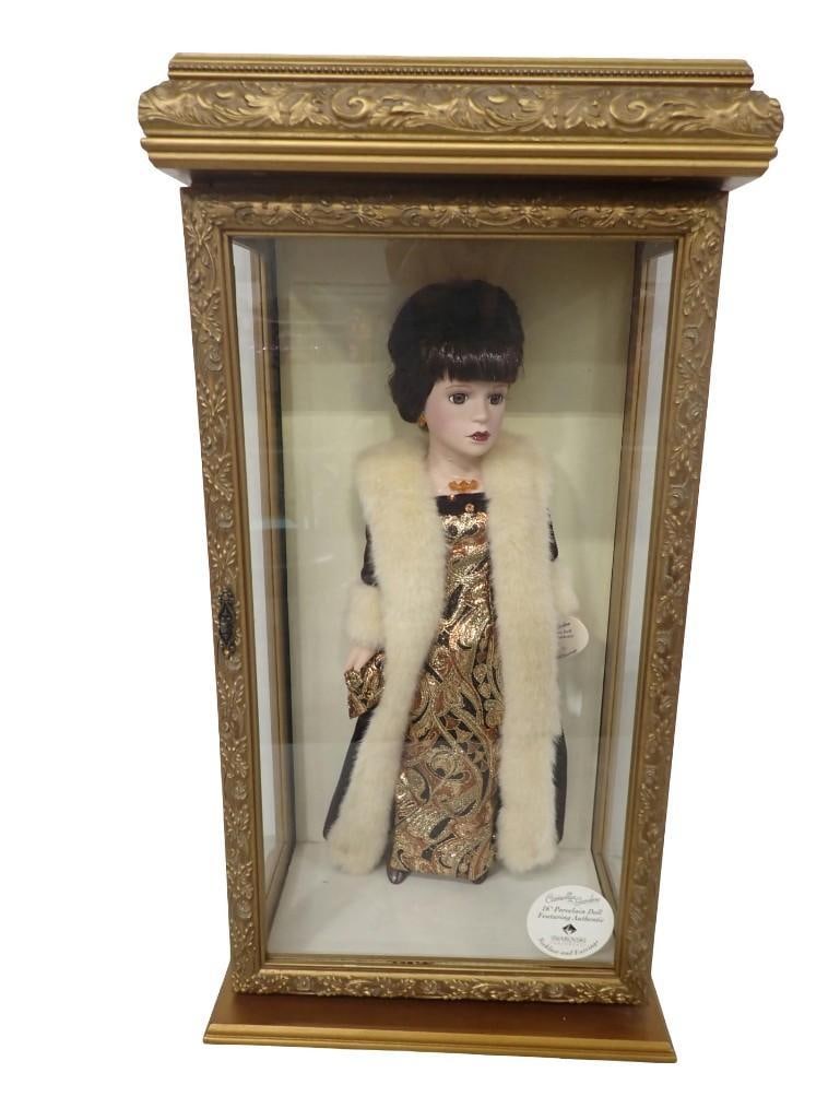 Camellia Garden 16" Porcelain Doll with Swarovski Necklace and Earrings with Display Box: Camellia Garden 16" Porcelain Doll with Swarovski Necklace and Earrings with Display Box All pictures are considered part of the description and should be examined carefully by bidders. Live Aucti