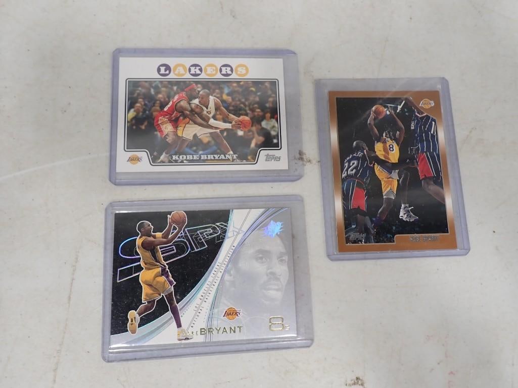 3 Kobe Bryant Basketball Cards: 3 Kobe Bryant Basketball Cards All pictures are considered part of the description and should be examined carefully by bidders. Live Auctioneers is now offering Live Shipping through them. This is an 