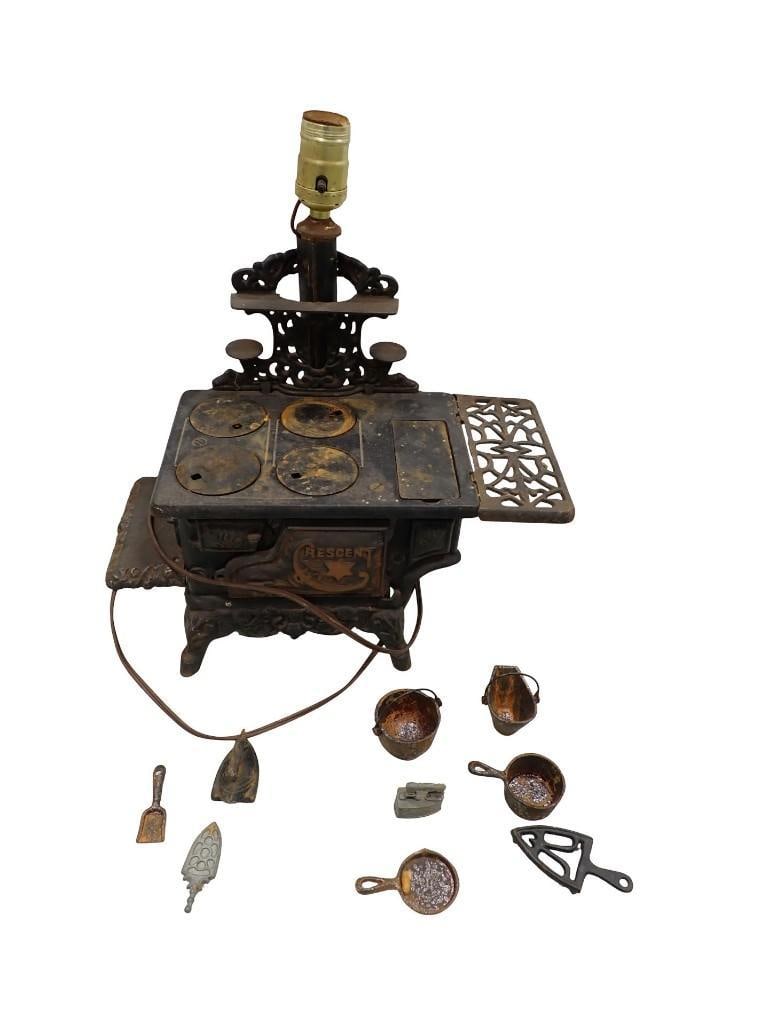 Vintage Cast Iron Toy Stove with Accessories and has been converted into a lamp (1 of 13)