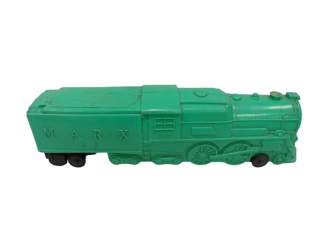 Marx "333" plastic whistling locomotive toy train engine in rare Teal color: Marx "333" plastic whistling locomotive toy train engine in rare Teal color All pictures are considered part of the description and should be examined carefully by bidders. Live Auctioneers