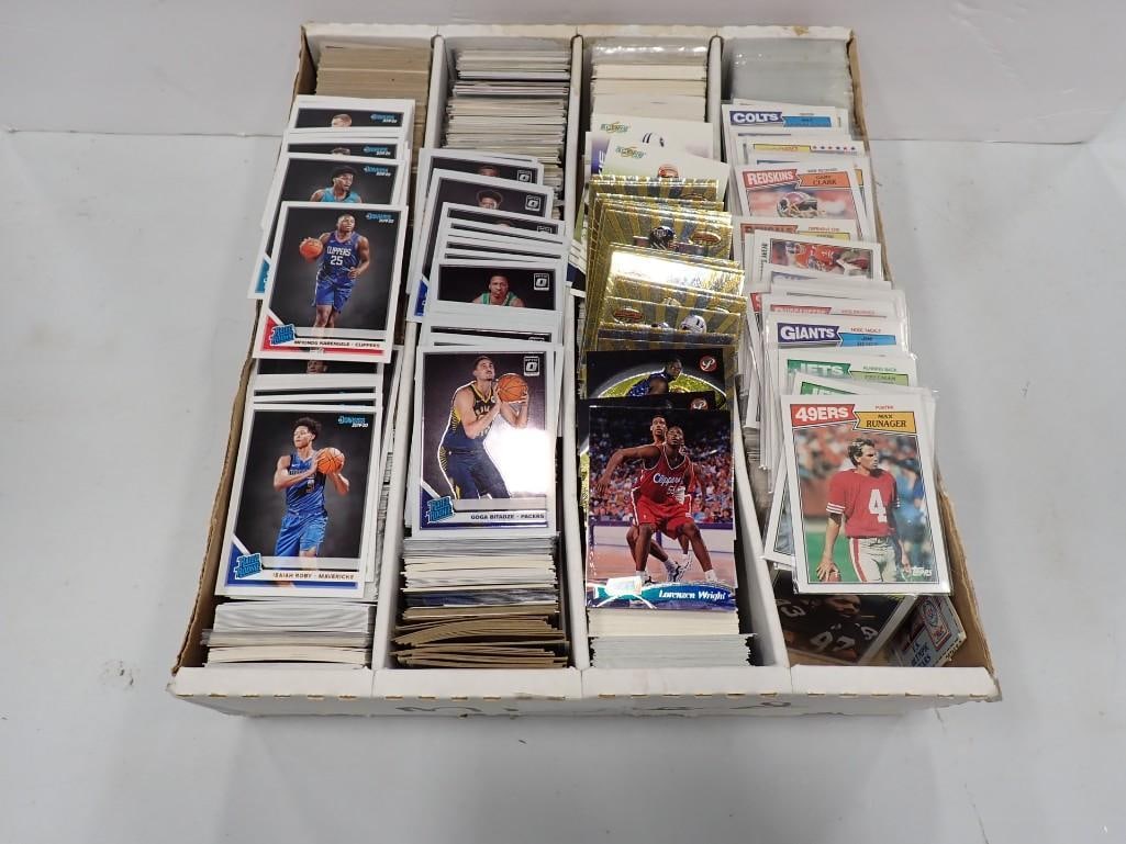Flat full of Basketball and Football Cards including Vintage: Flat full of Basketball and Football Cards including Vintage All pictures are considered part of the description and should be examined carefully by bidders. Live Auctioneers is now offering Live